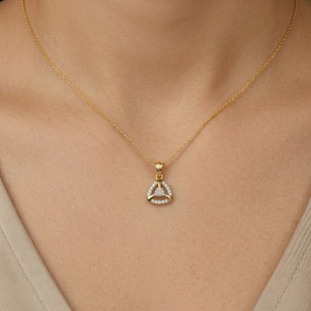 Women wearing gold and diamond partywear pendant