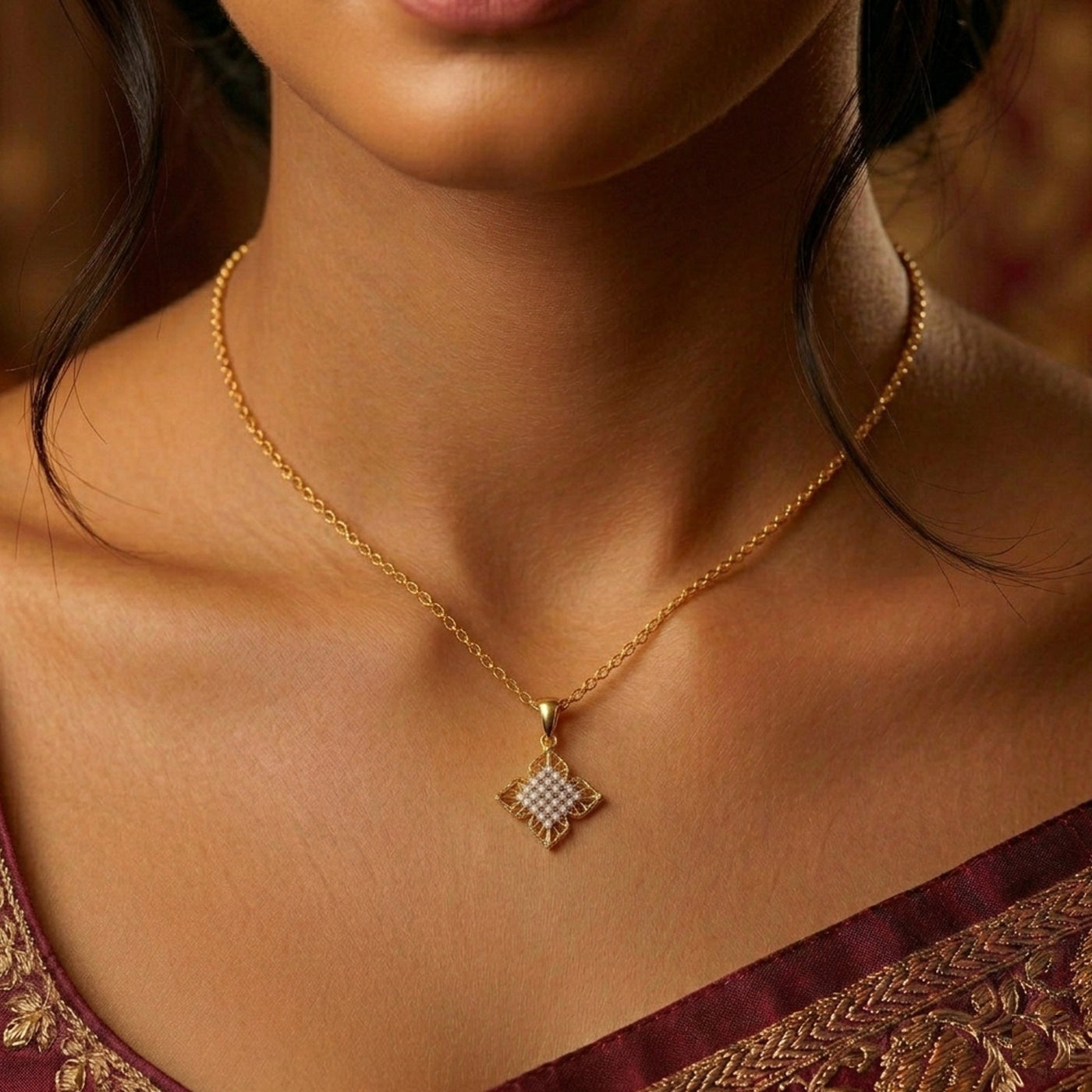 Yellow gold and diamond floral pendant on womens neck