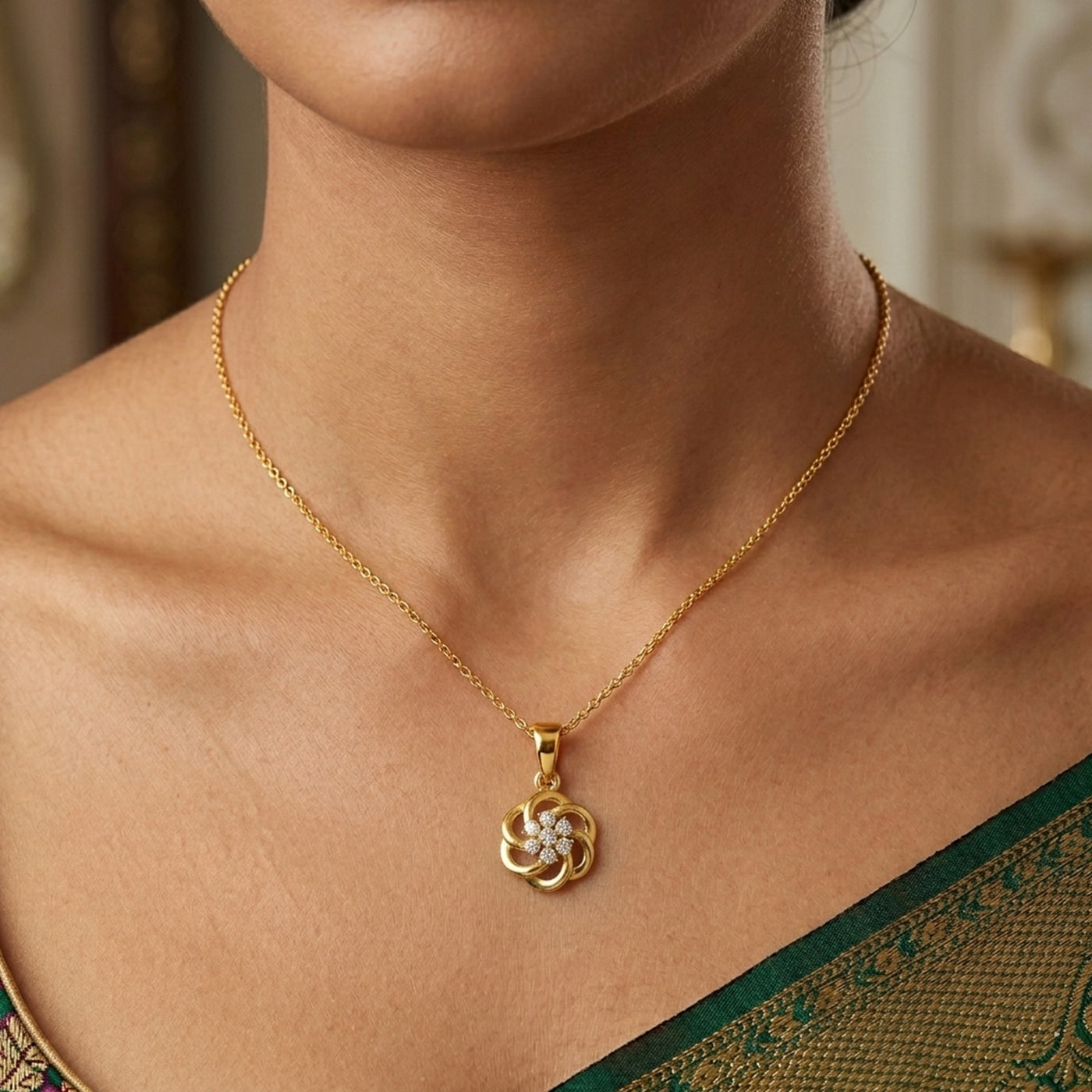 Yellow gold and diamond floral pendant on womens neck
