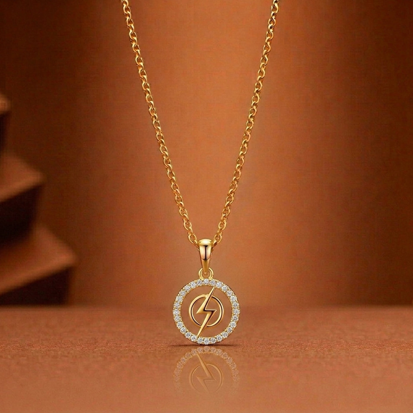 Yellow gold and diamond pendant on brown background