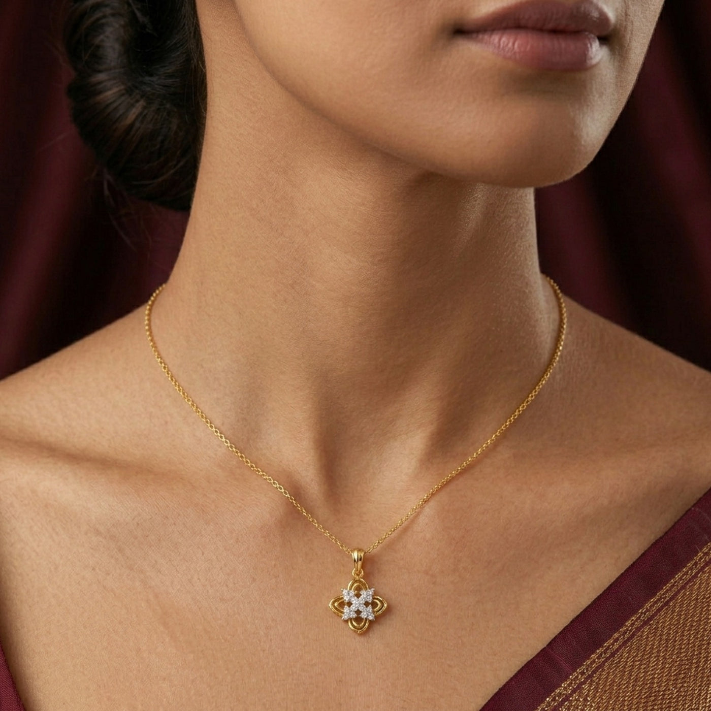 Yellow gold and diamond pendant on womens neck