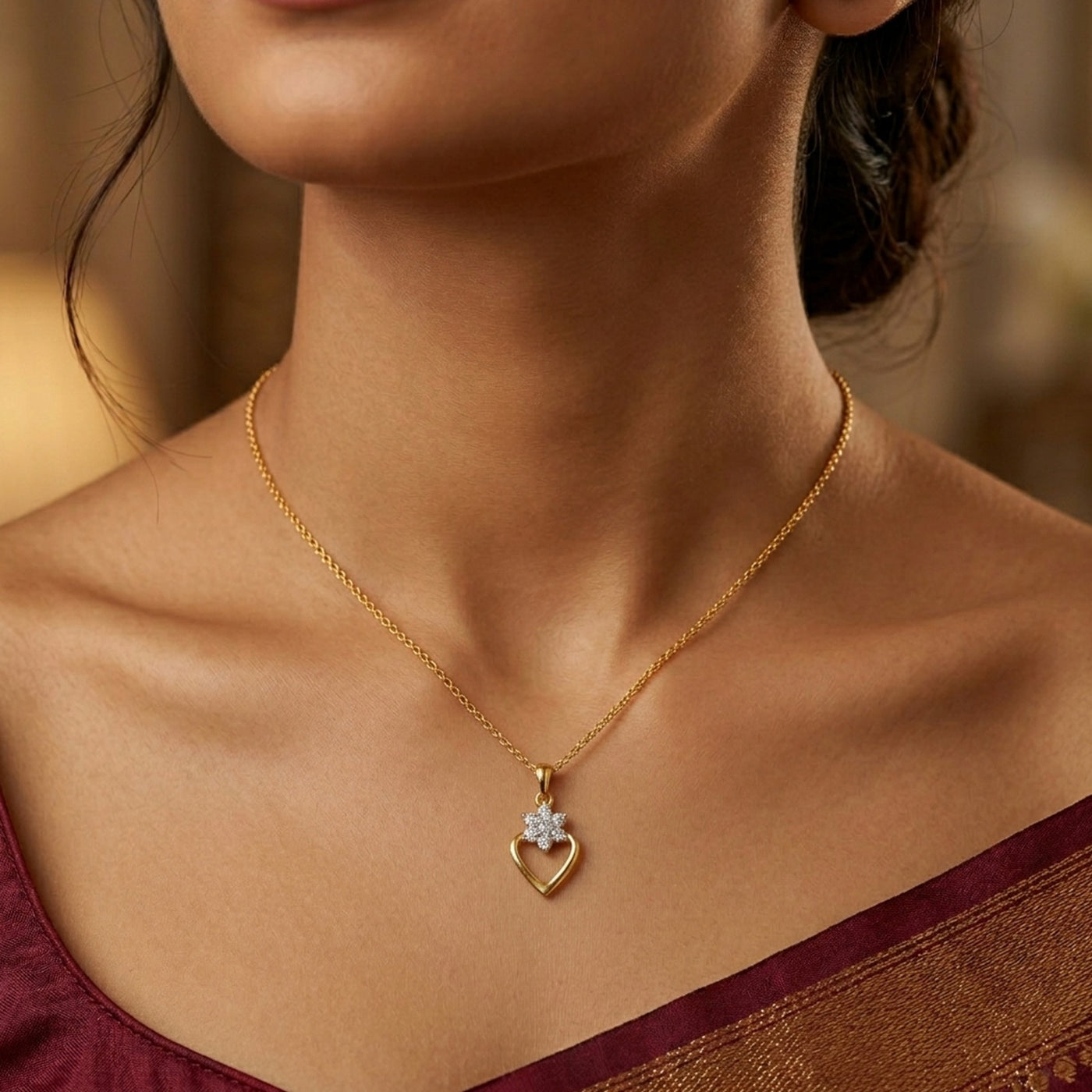 Yellow gold and diamond pendant on womens neck 