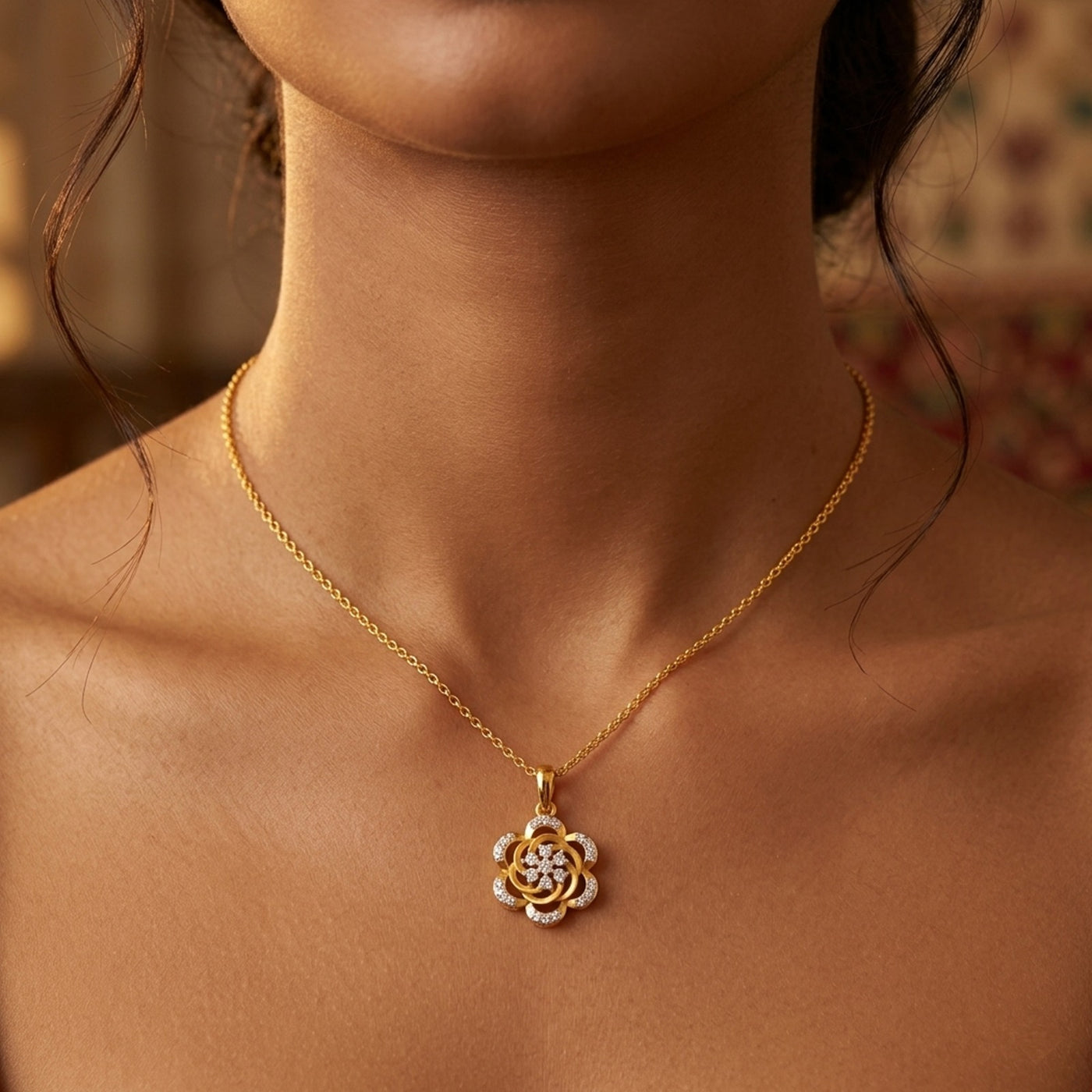 gold and diamond pendant on womens neck