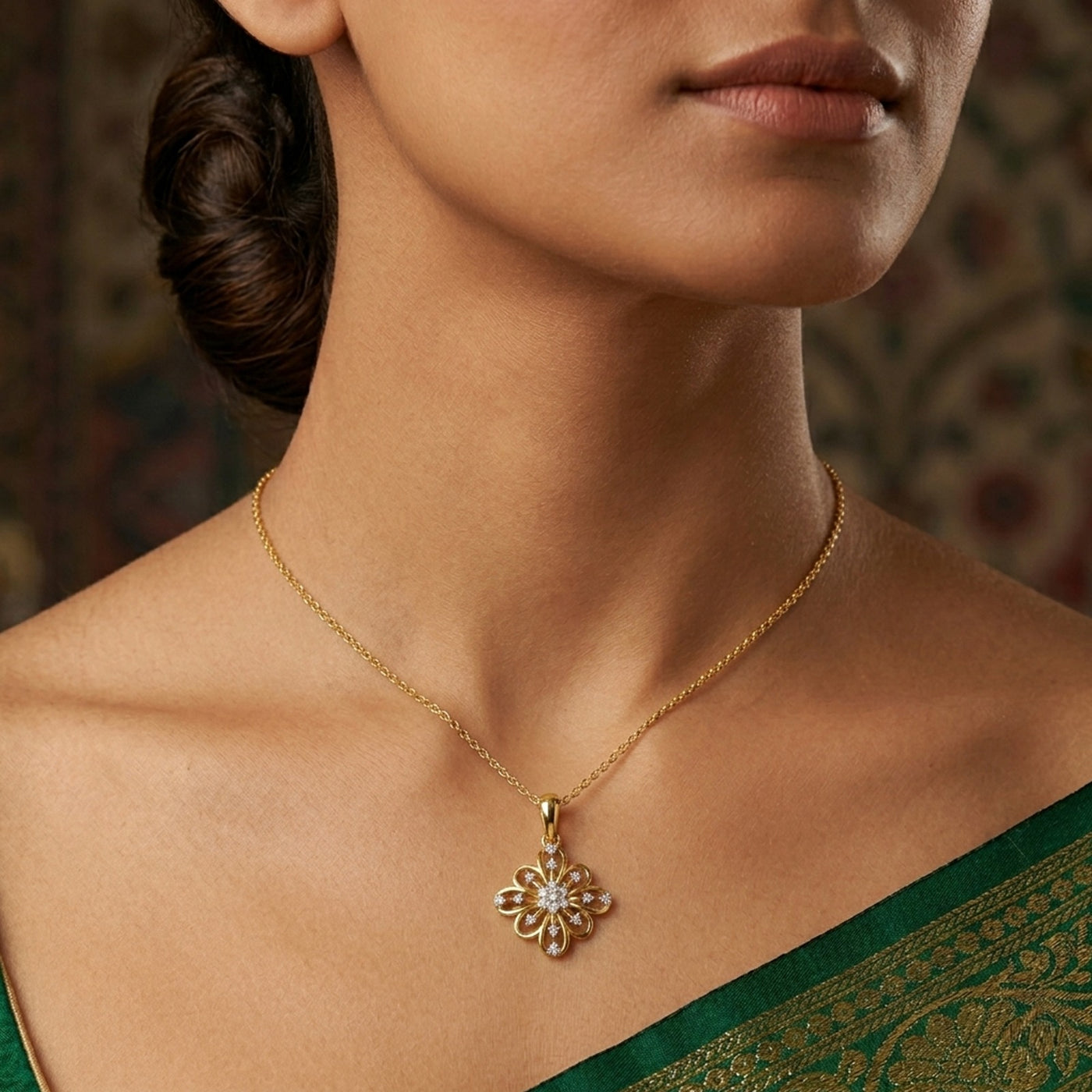 gold and diamond floral pendant on womens neck