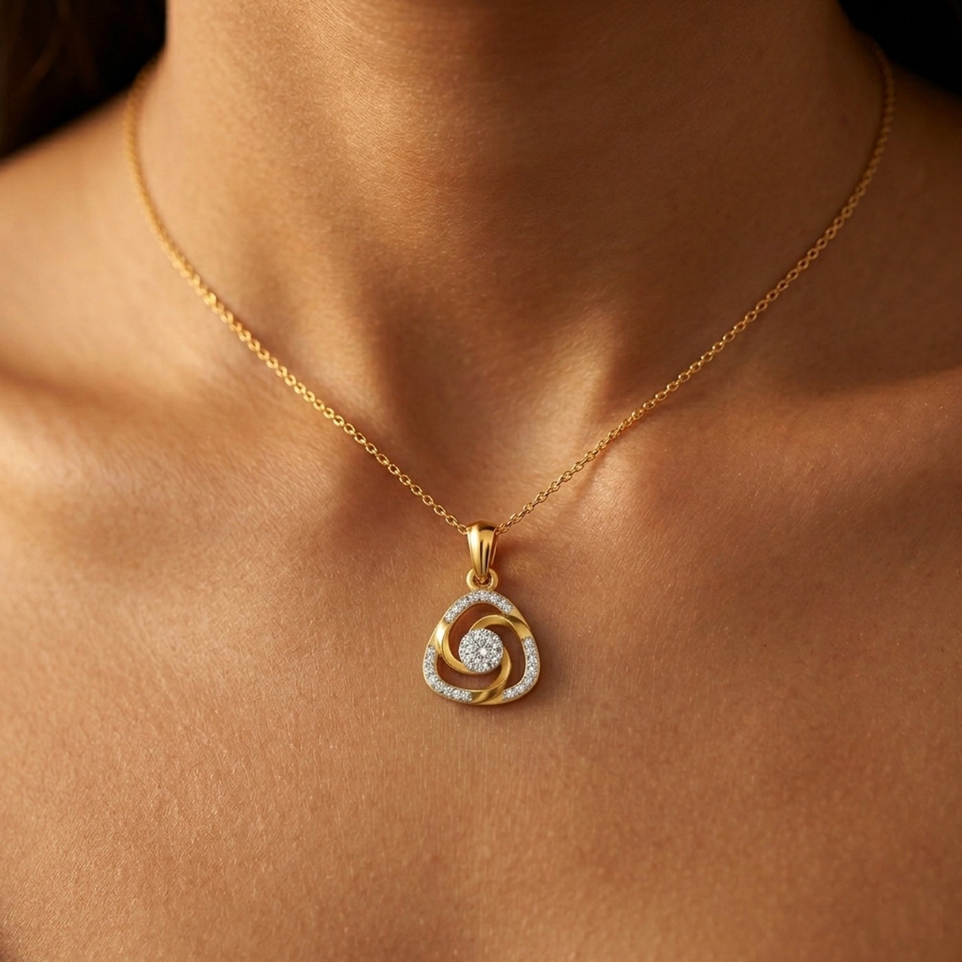 Gold necklace with a diamond pendant on a person's neck