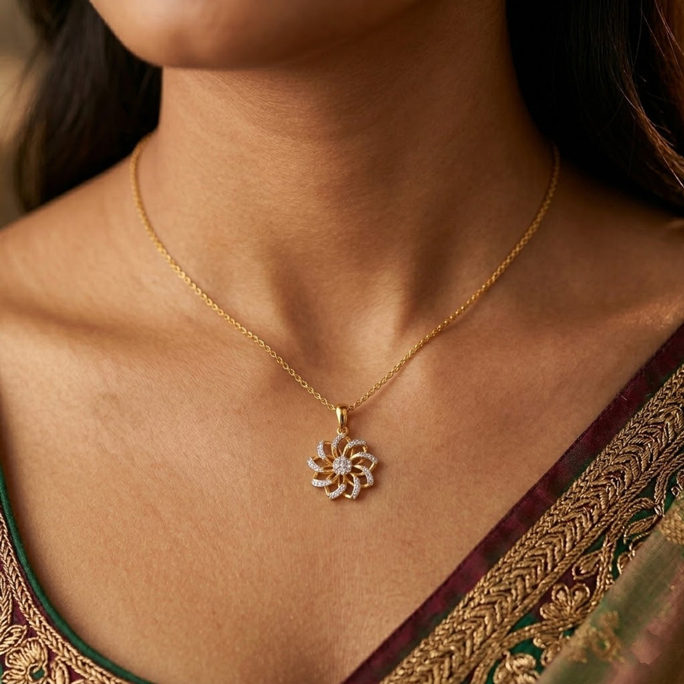Gold and diamond pendant on womens neck 