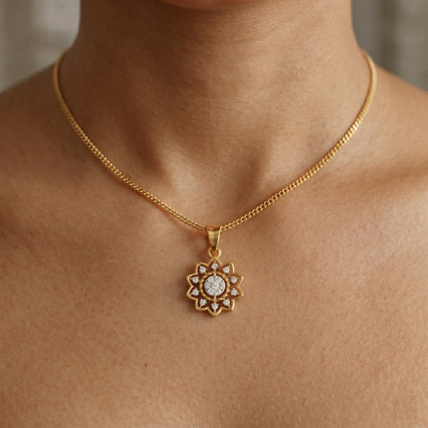 Gold and diamond floral pendant on a women's neck