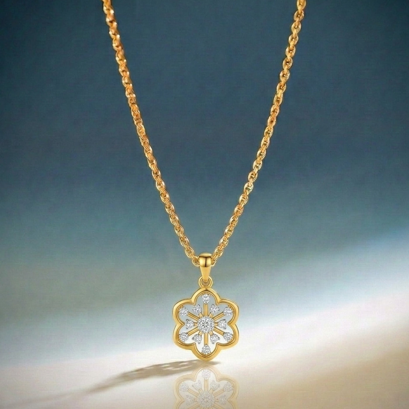 Gold necklace with a floral pendant on a gradient background