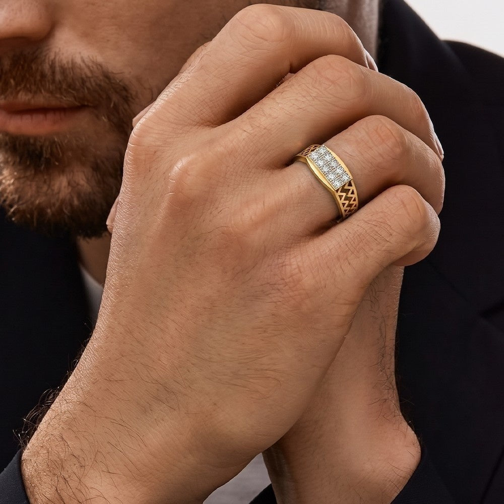 Close-up of a man's hand wearing a gold ring with a diamond band.