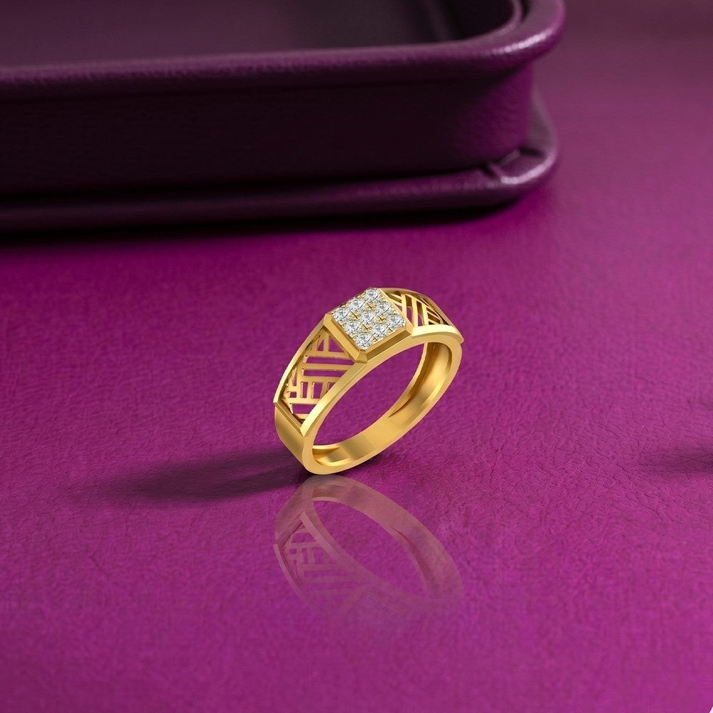 Gold and diamond men's ring on a purple refective surface. 