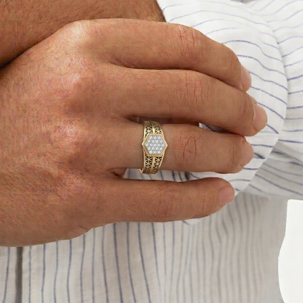 Hand wearing a gold ring with a diamond on a striped shirt background