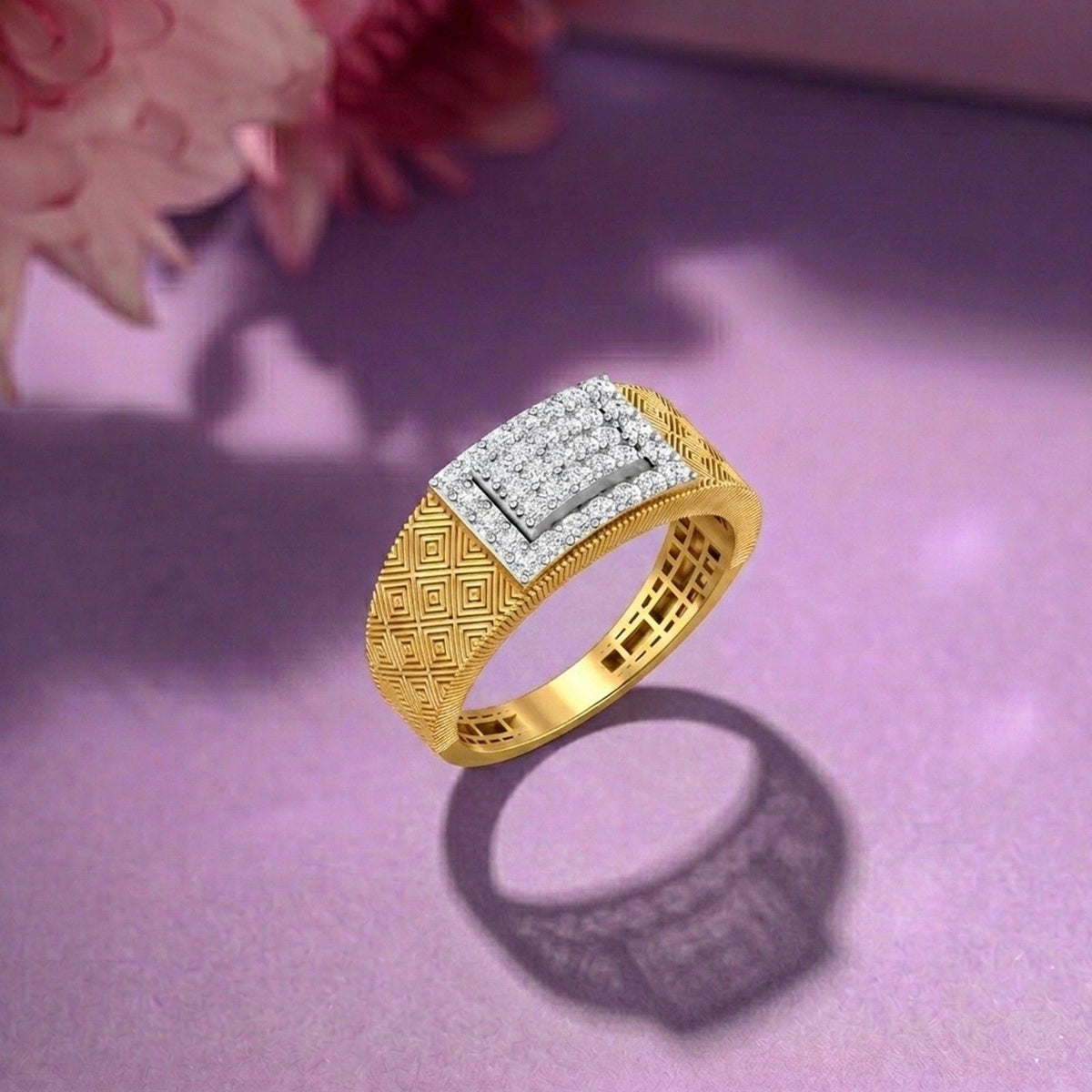 Gold ring with diamond-studded top on a purple surface