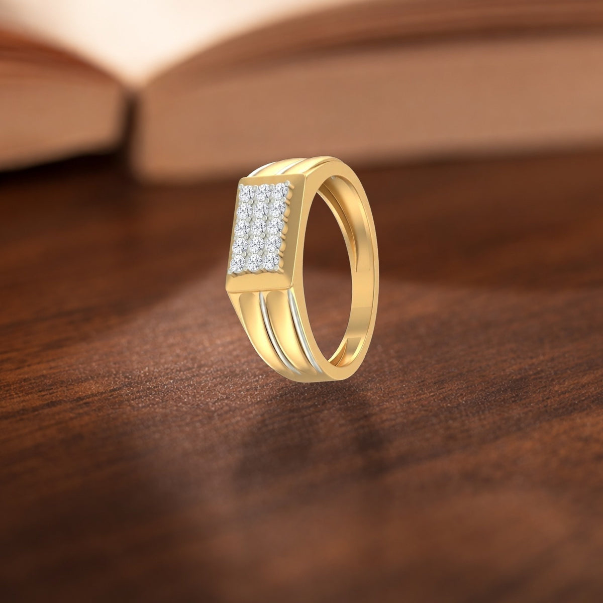 Gold ring with diamonds on a wooden surface