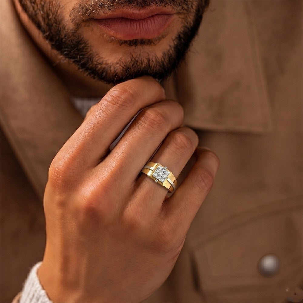 Close-up of a man's hand wearing a gold ring with a diamond, against a brown background.