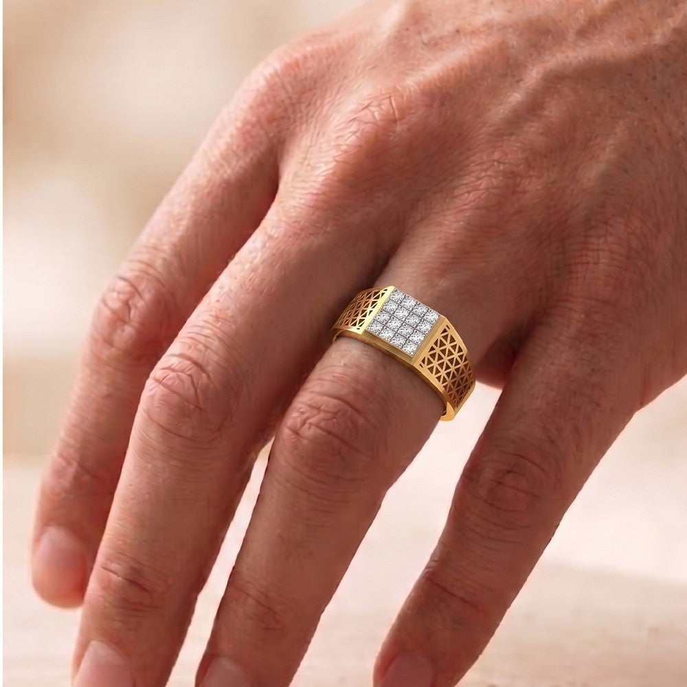 Gold ring with a diamond on a person's finger against a blurred background