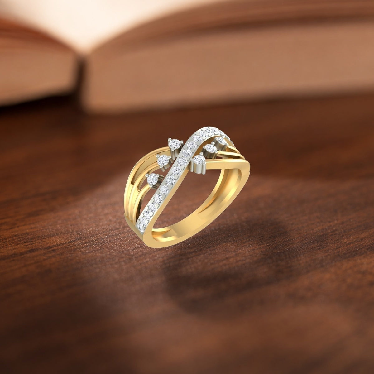 Gold ring with diamond accents on a wooden surface.