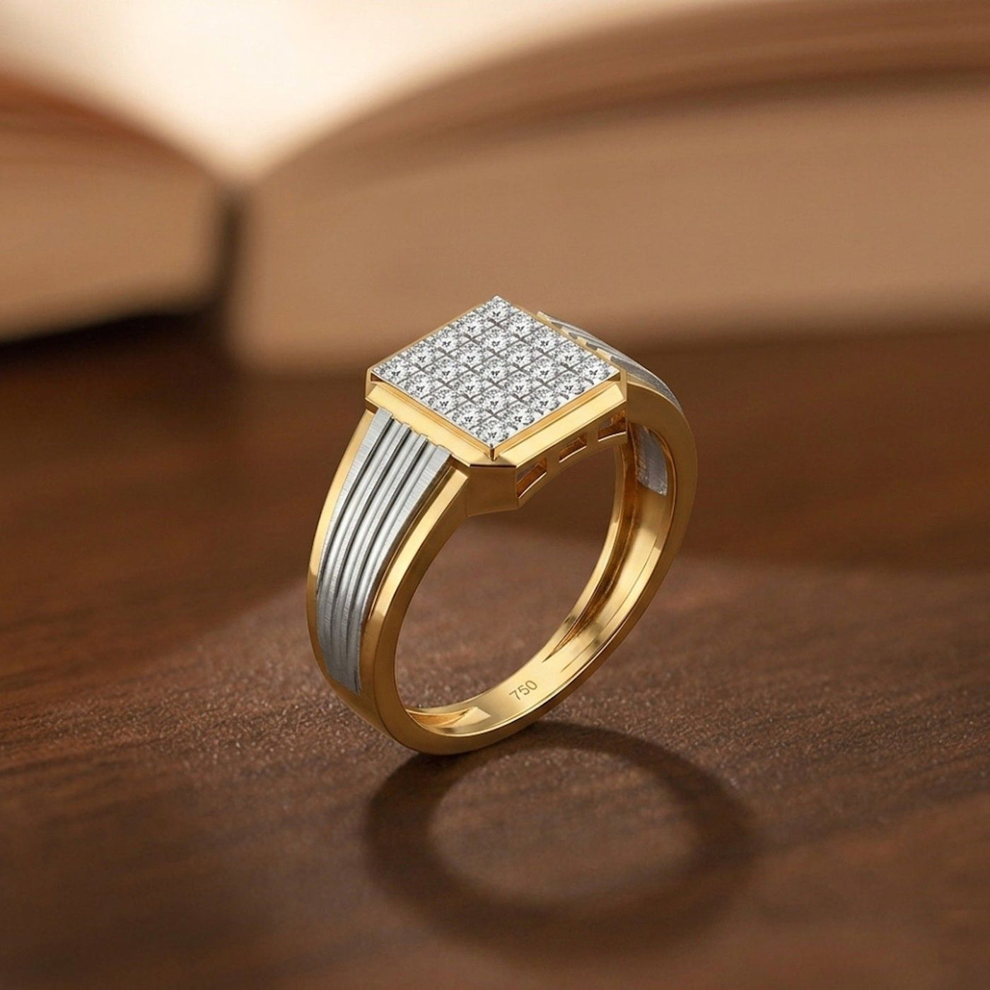 Gold and diamond ring with diamond accents on a wooden surface.