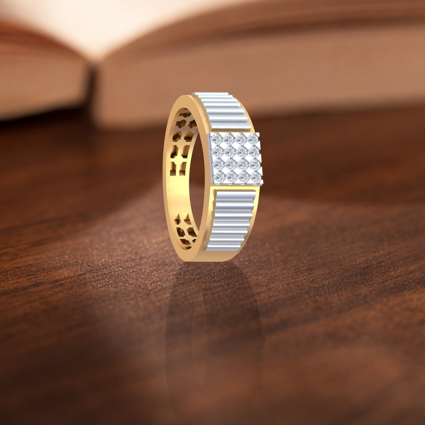 Gold ring with a geometric design, featuring a central diamond cluster on a wooden surface.