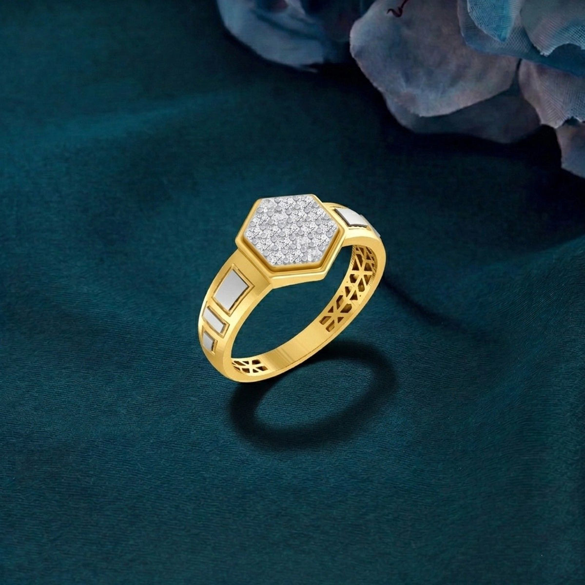 Gold ring with diamond accents on a dark green background