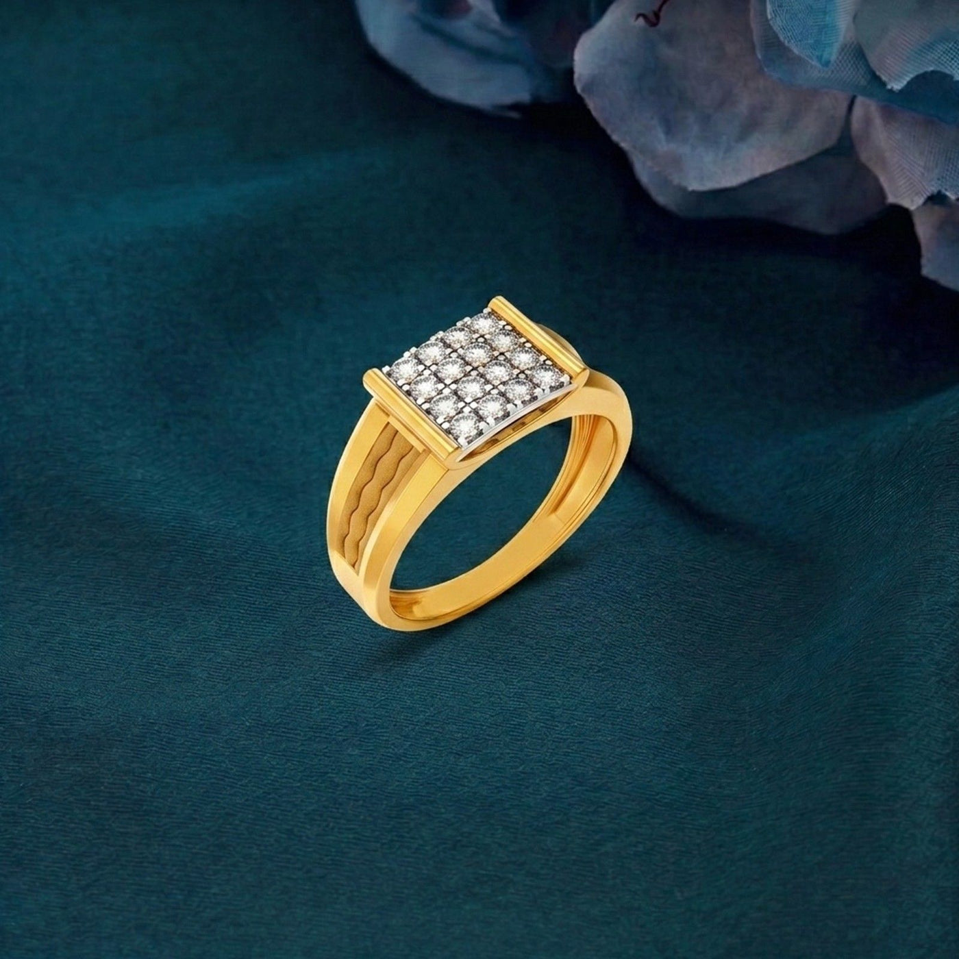 Gold ring with diamond accents on a dark green background